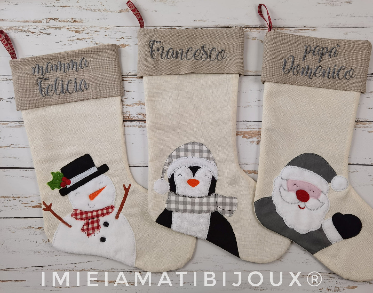 Calze della befana decorate e cucite a mano babbo natale, pinguino, renna e pupazzo di neve.