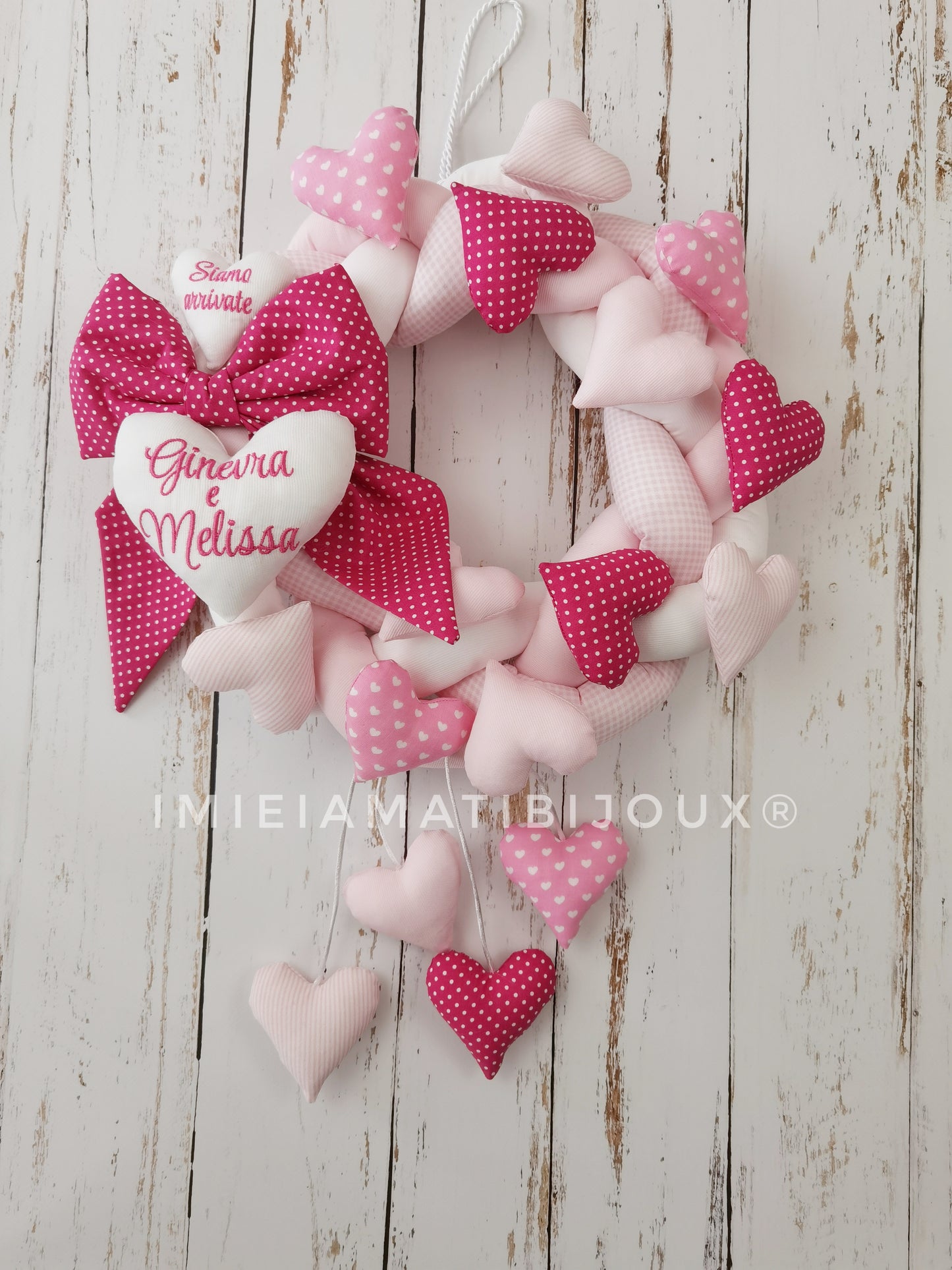 Ghirlanda fiocco nascita mille cuori +cuori pendenti