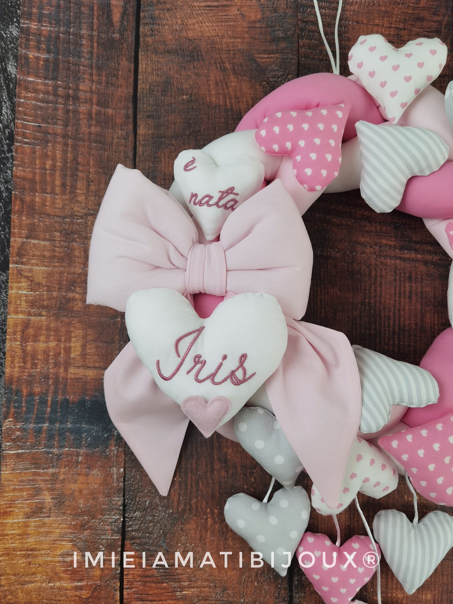 Ghirlanda fiocco nascita mille cuori +cuori pendenti